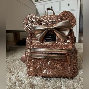 Rose gold Disney parks loungefly